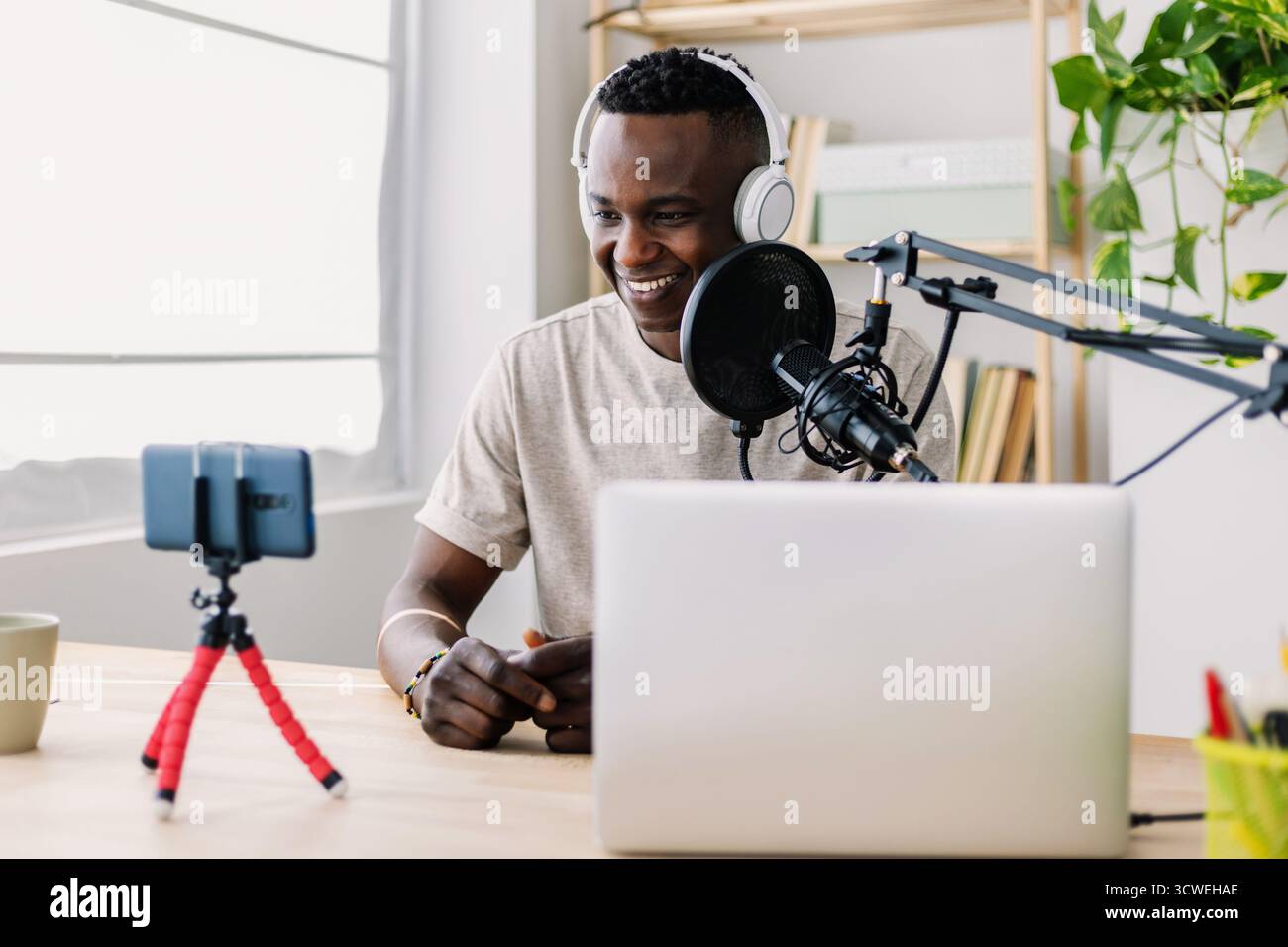 Confident video content creator recording hi res stock photography and