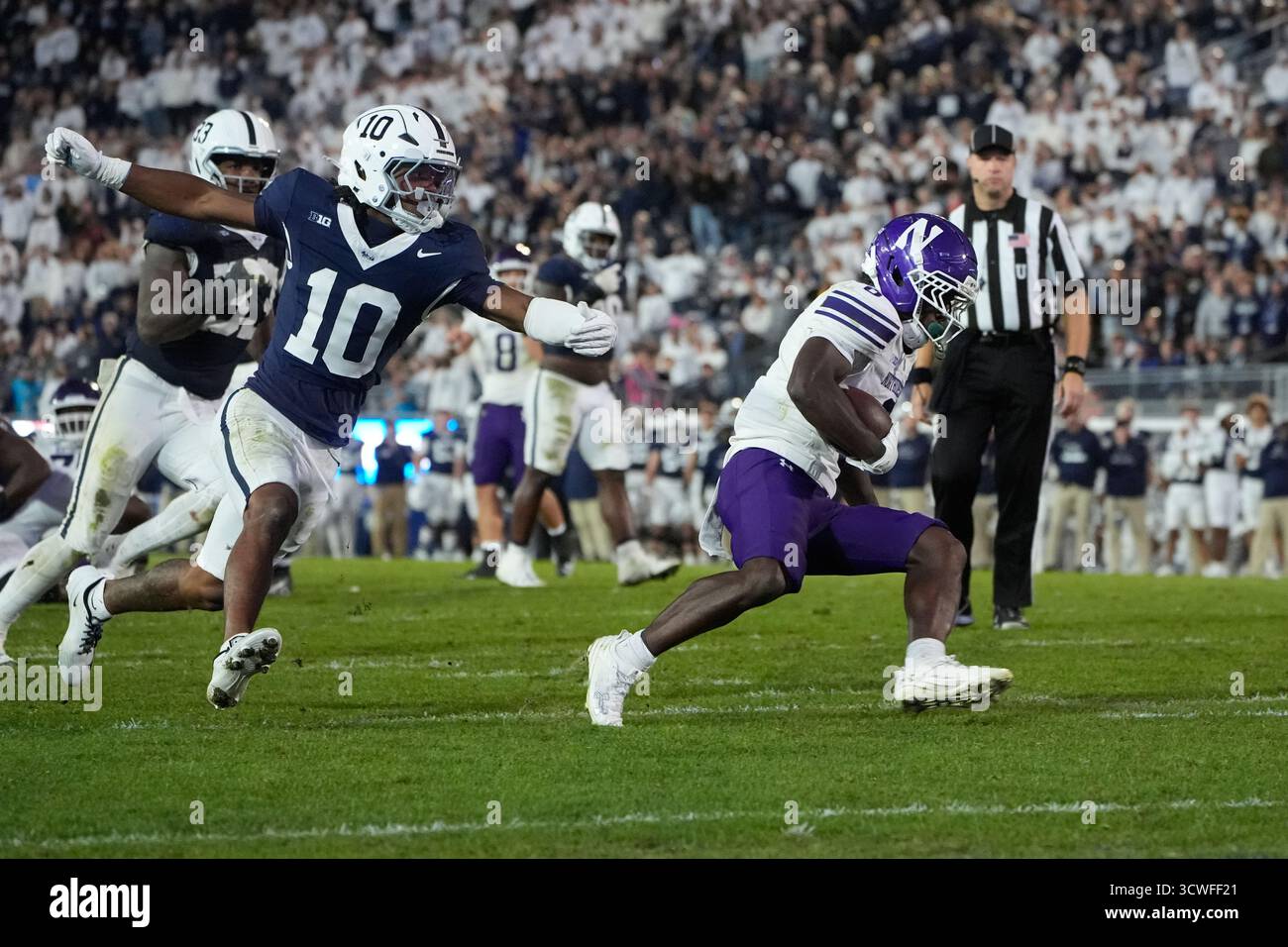 UNIVERSITY PARK, PA - OCTOBER 11: Northwestern Wildcats Running Back ...