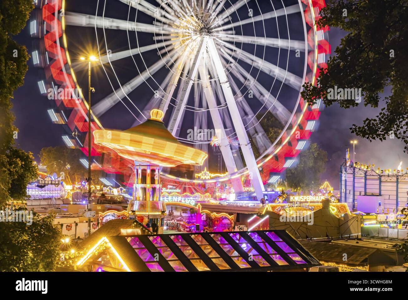 Folk festival in Stuttgart. The 178th Cannstatter Volksfest on the Wasen is one of the most important traditional festivals in Germany. Ferris wheel, Stock Photo