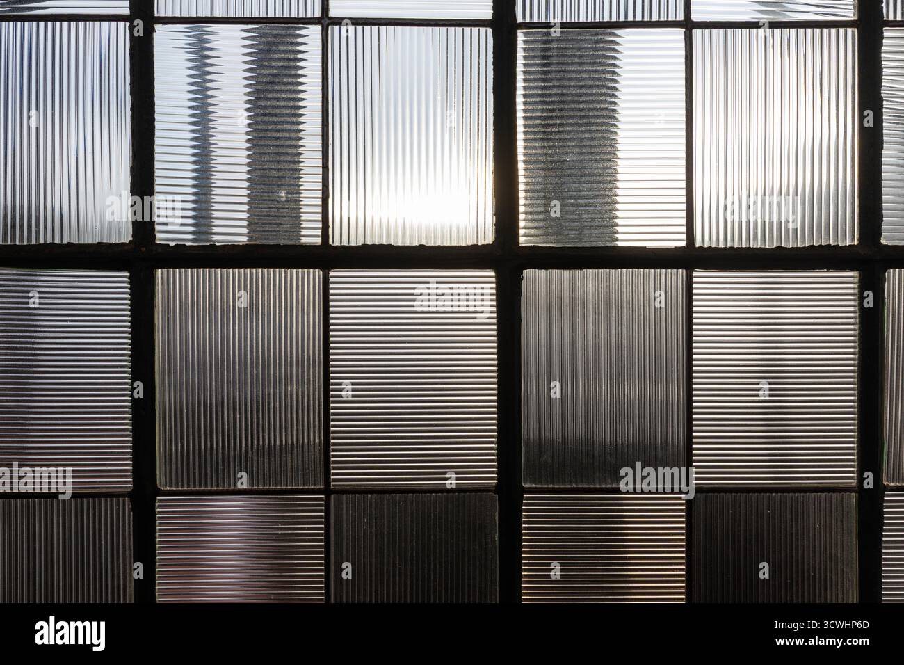 pattern of glass in an industrial building in harmonic structure as ...