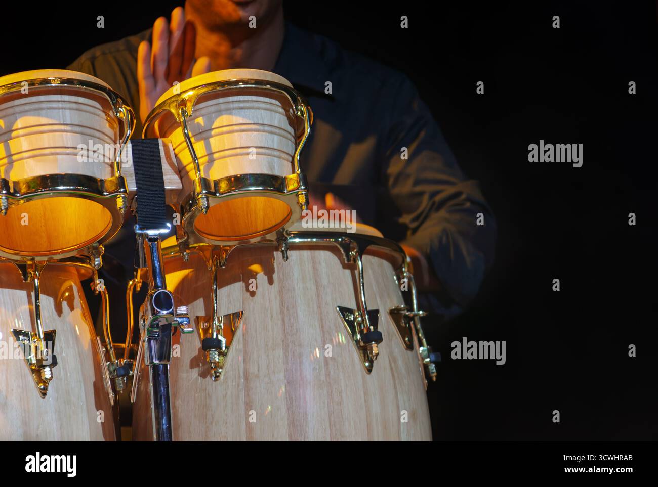 Hand tapping bongo drum hi-res stock photography and images - Alamy