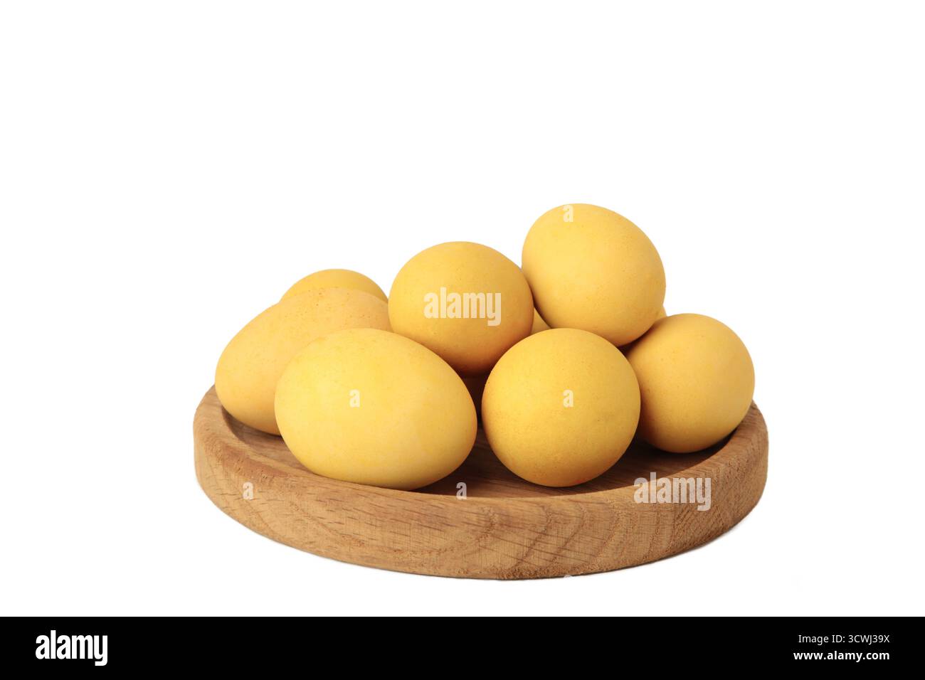 Yellow easter eggs isolated on white background. Top view Stock Photo