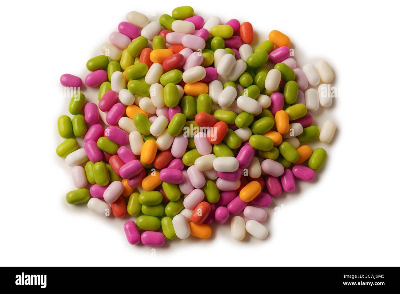 Sweet multicolored candies isolated on a white background. Stock Photo