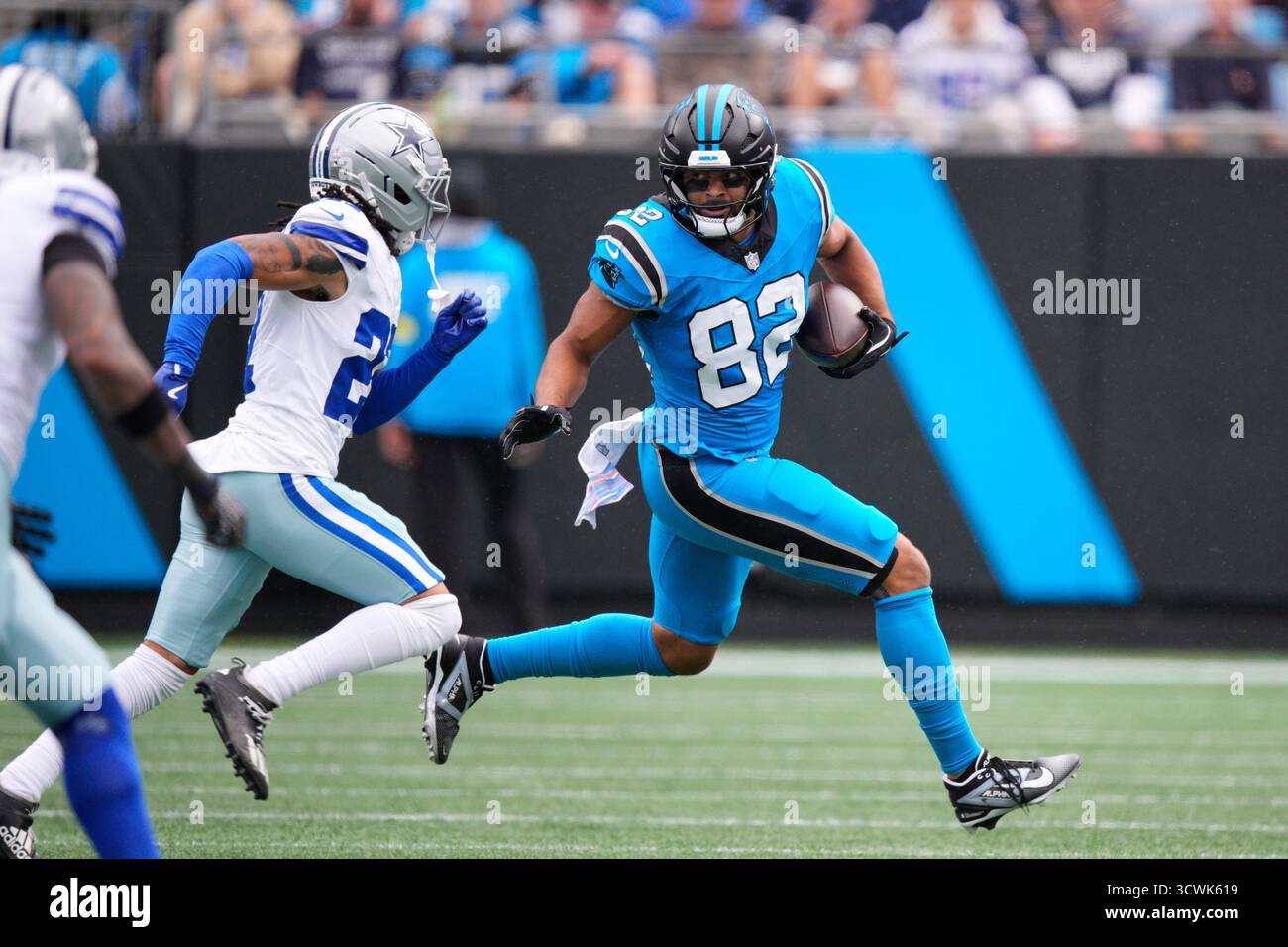 Carolina Panthers tight end Tommy Tremble (82) gains yards after a ...
