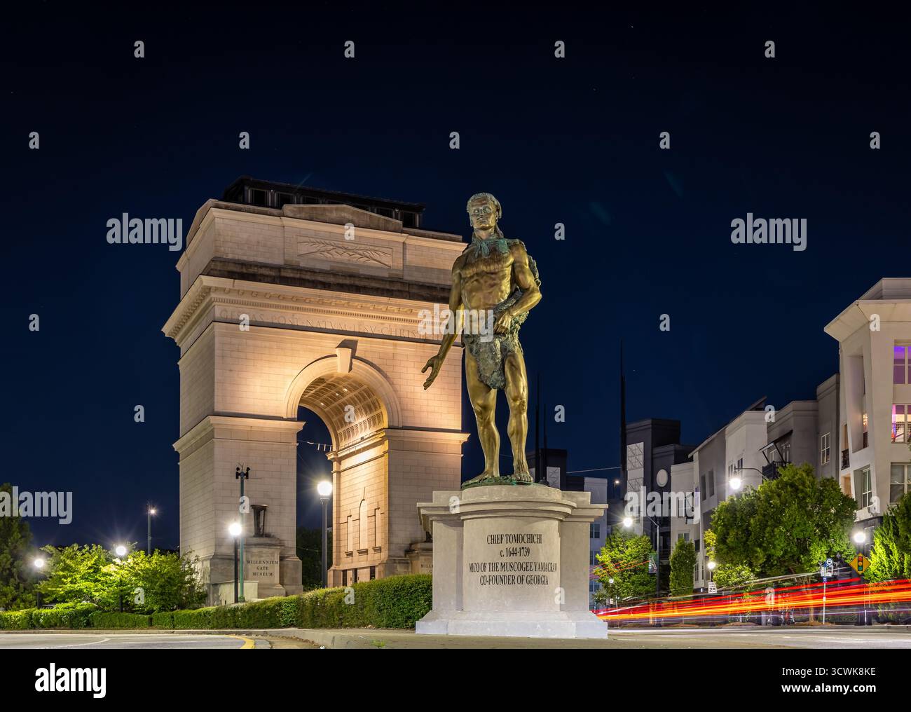 Nighttime image of a prominent bronze statue of an Atlanta chief in ...
