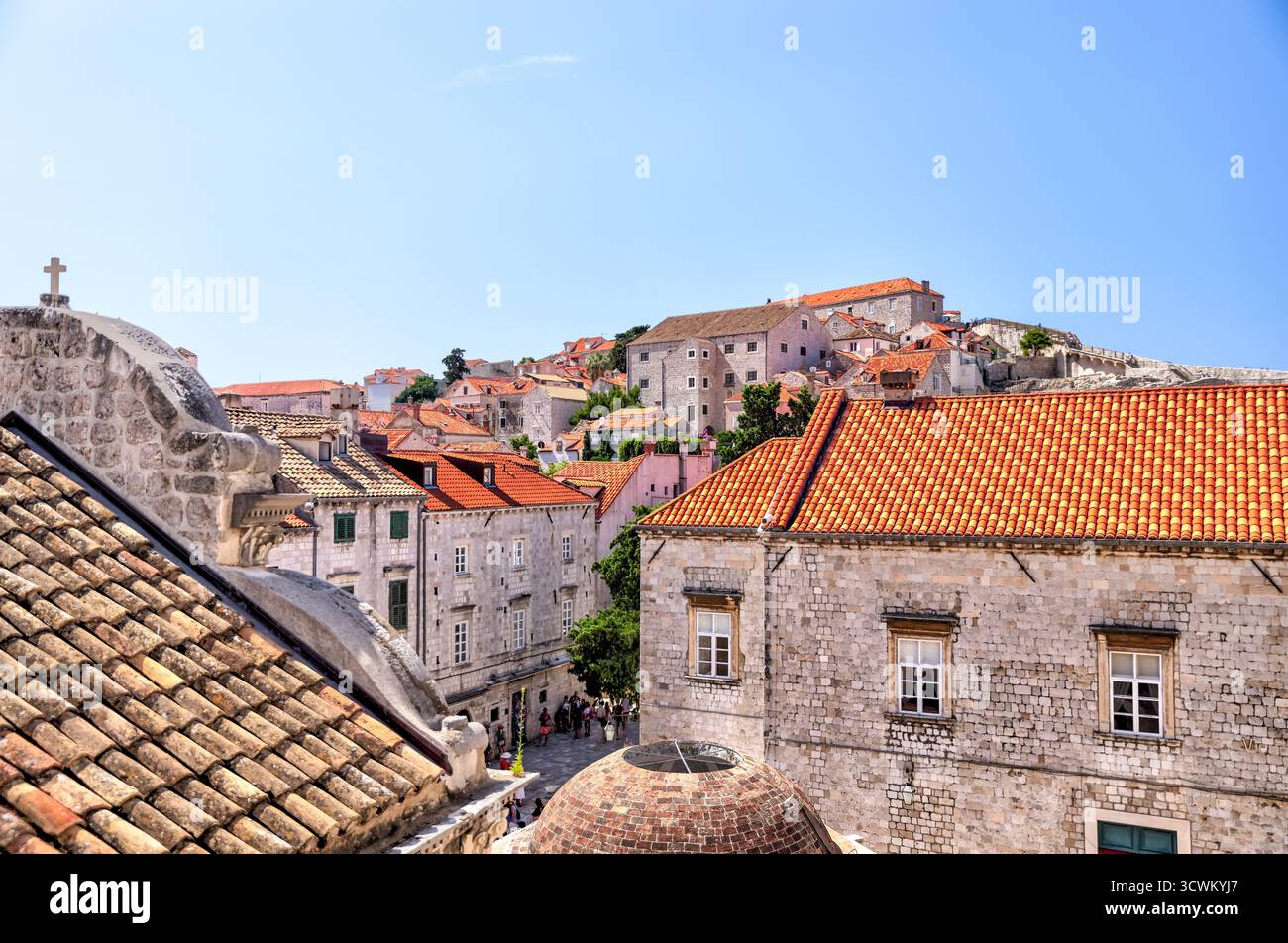 A Panoramic View Over The Terracotta Rooftops Of Dubrovnik s Old Town a-panoramic-view-over-the-terracotta-rooftops-of-dubrovnik-s-old-town