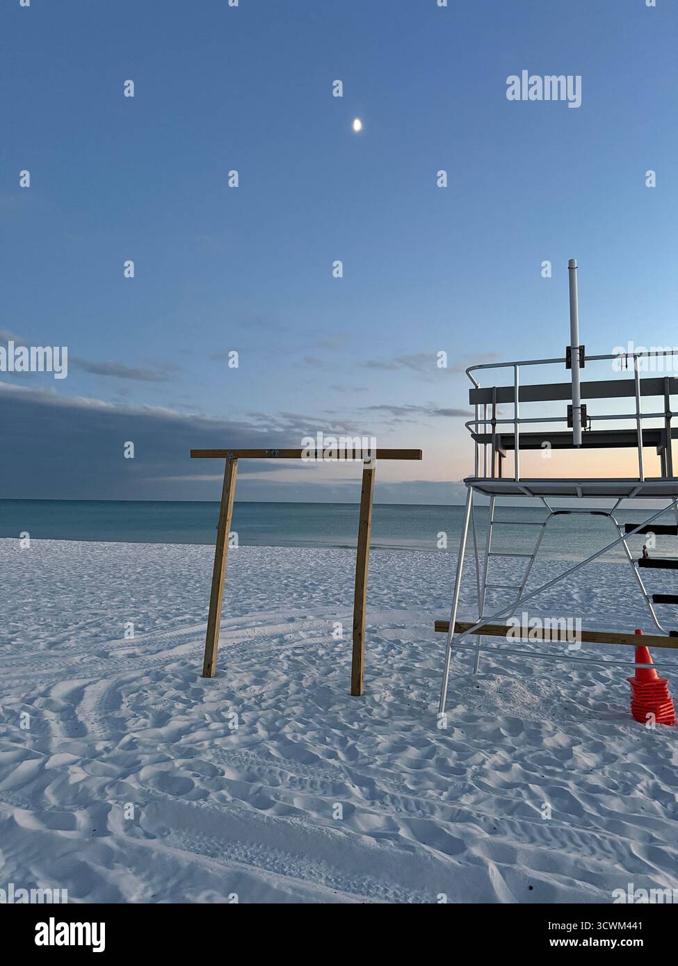Lifeguard tower and view of moon over the Gulf of Mexico - Smartphone Captured Stock Image