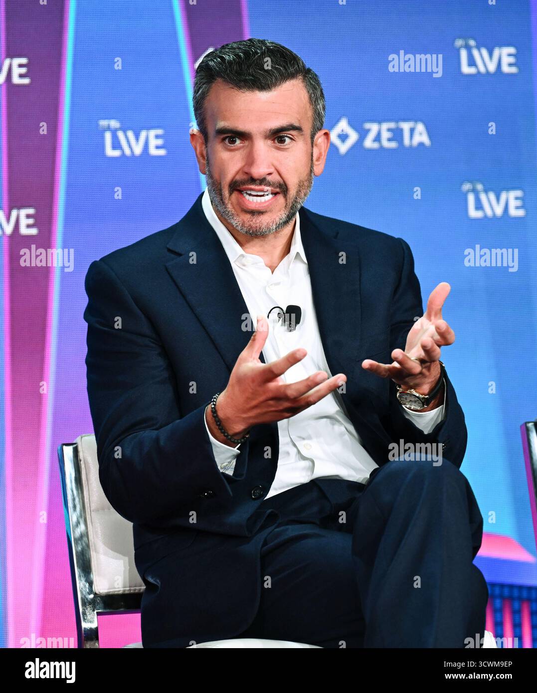 ZoomInfo founder and CEO Henry Schuck speaks at the Zeta Live ...