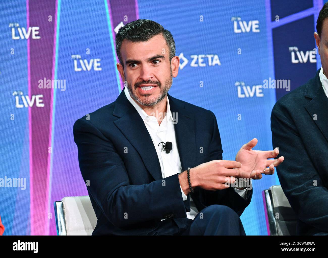ZoomInfo founder and CEO Henry Schuck speaks at the Zeta Live ...