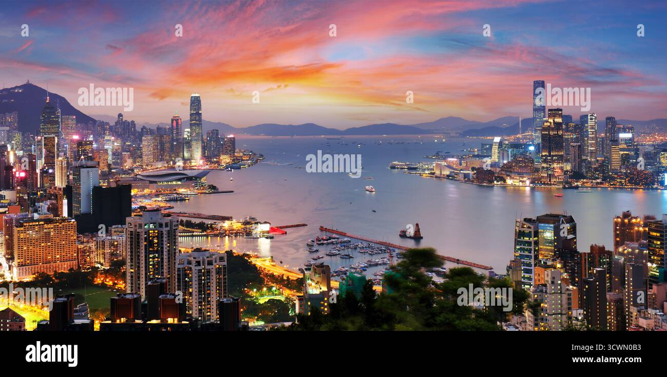 Hong Kong cityscape with skyscrapers at sunset, panorama Stock Photo ...