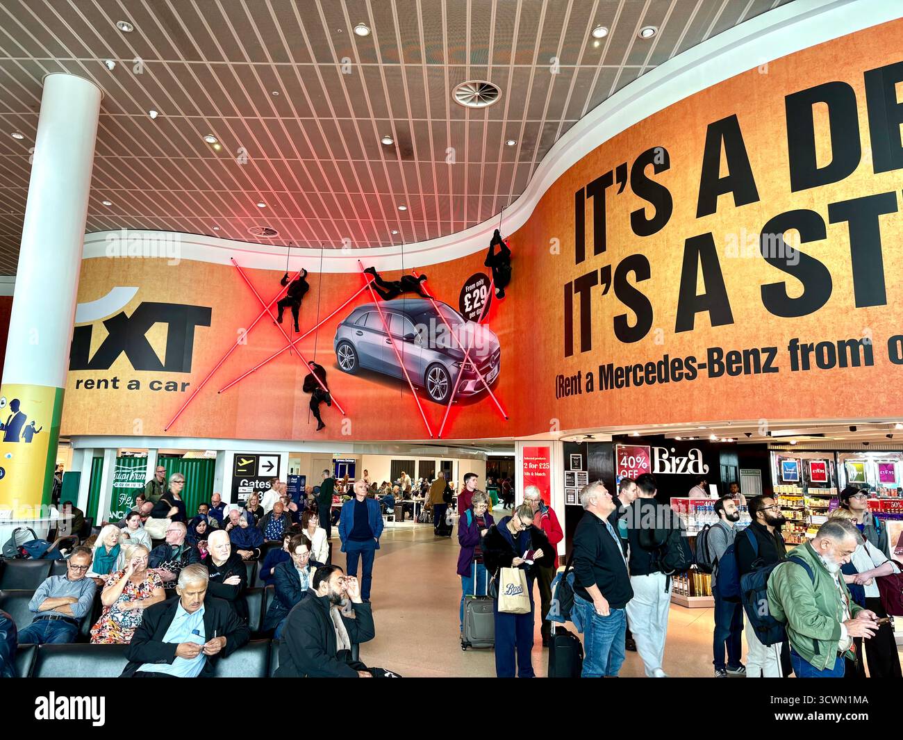 Sixt car hire rental advertising and marketing at Manchester International airport,England,UK,2025 - Smartphone Captured Stock Image