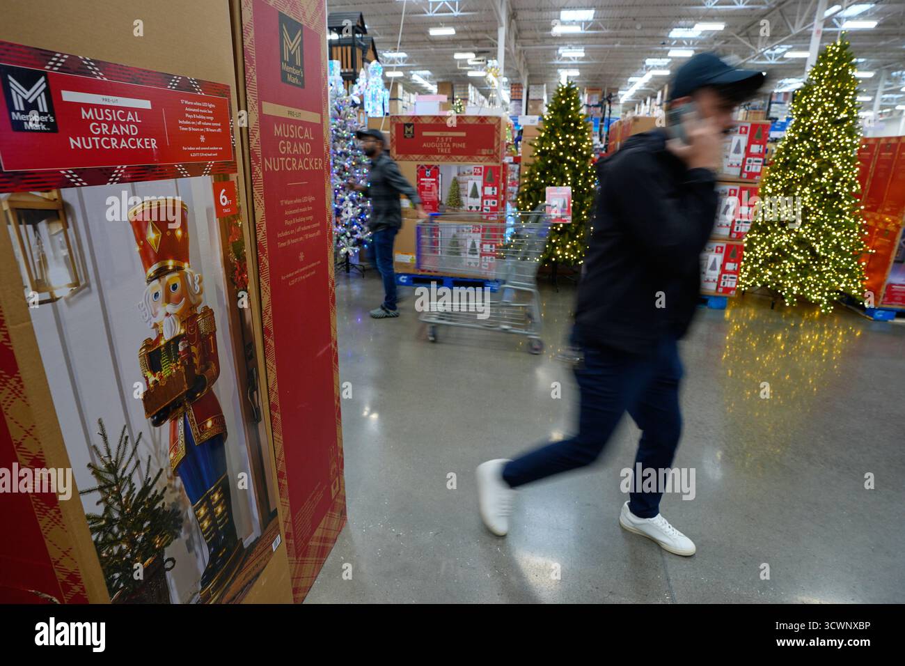 People shop among holiday displays at a Sam's Club, Wednesday, Sept. 24 ...