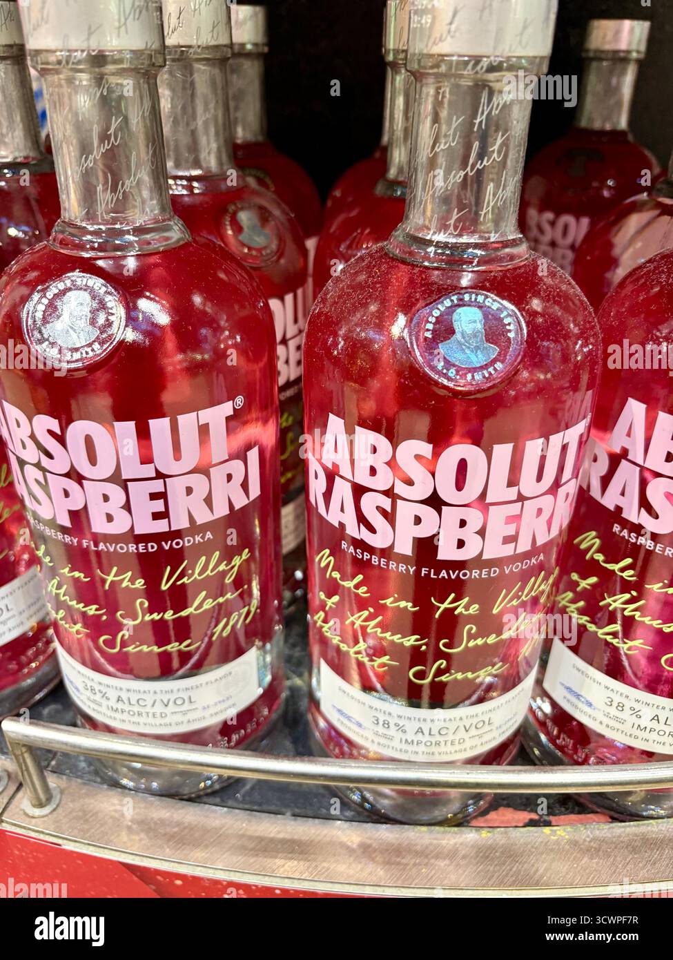 Absolut Raspberry vodka alcohol, for sale in duty free shop at Dubai international airport,United Arab Emirates - Smartphone Captured Stock Image