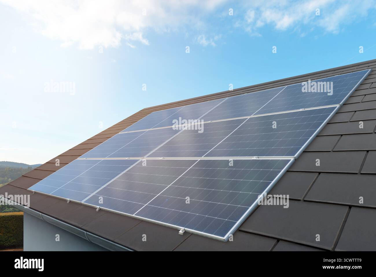 Solar panels installed on modern house roof generating renewable energy ...