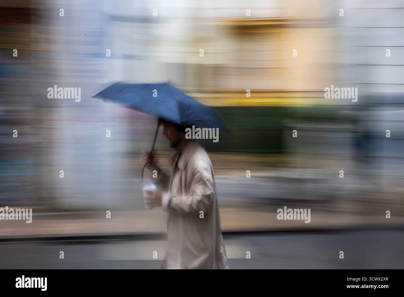 Rainy day urban walk hi-res stock photography and images - Alamy