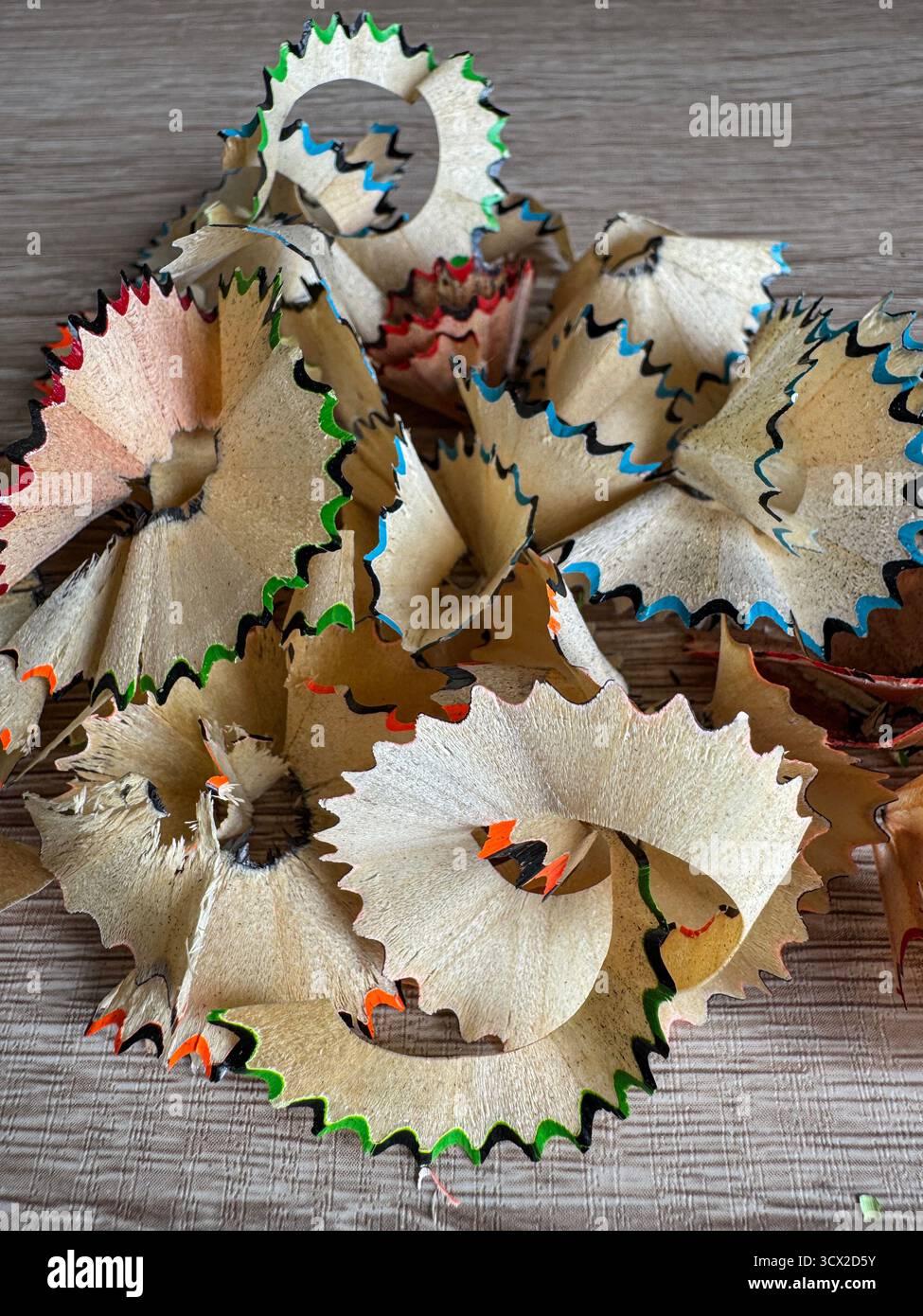Pencil shavings after using a sharpener to sharpen colored pencils - Smartphone Captured Stock Image