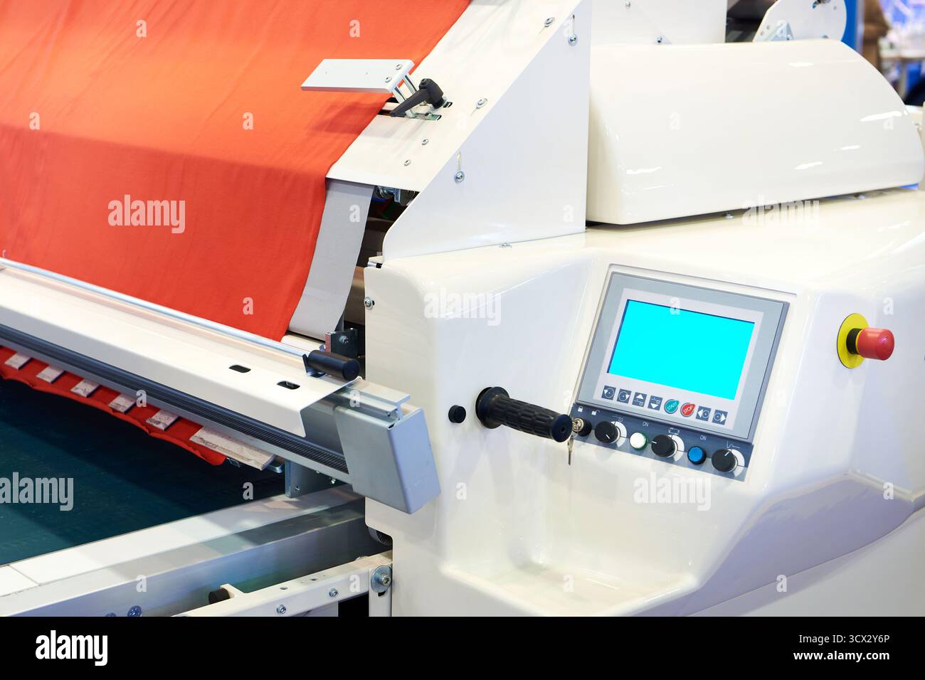 Automatic spreading machine with unique design cradle feed Stock Photo ...