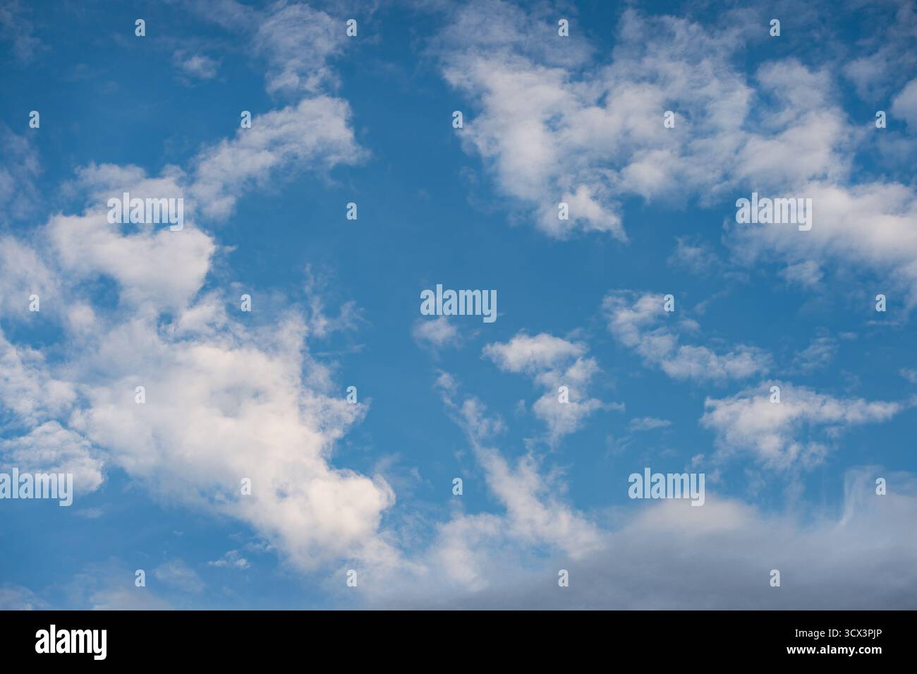 Blue Skies With Clouds Stock Photo