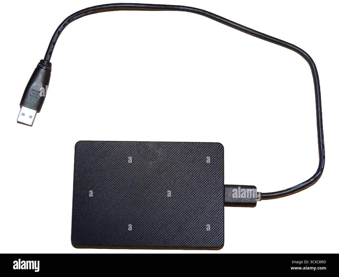 External hard drive with cable isolated on white Stock Photo