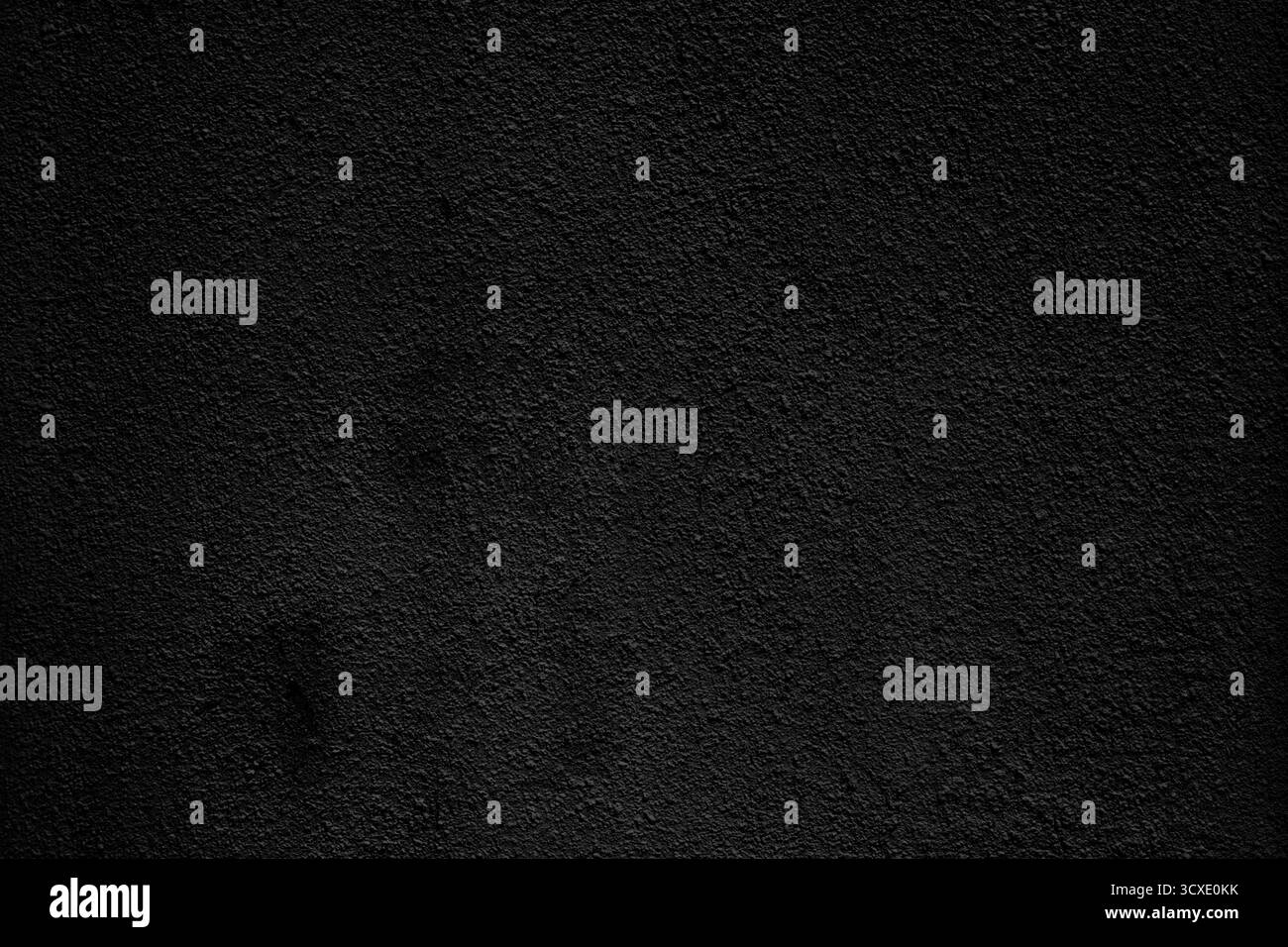 Black painted stained grange cement old wall. Dark aged surface. Stock Photo