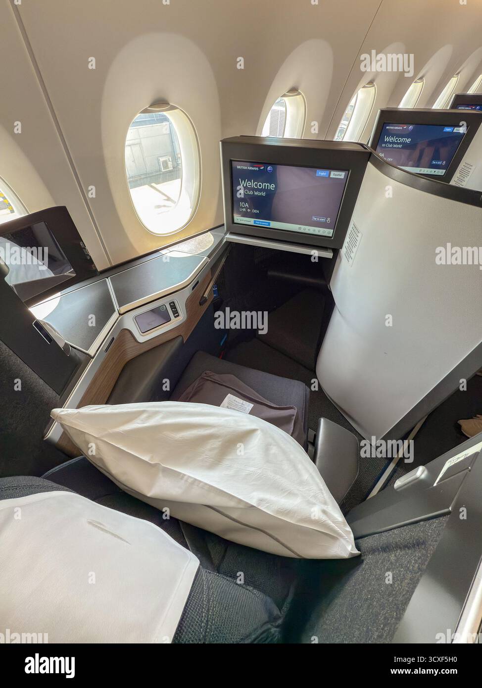 London, England, UK - 19 May 2025: Seat in the Club World business class cabin of a British Airways plane. No people. - Smartphone Captured Stock Image