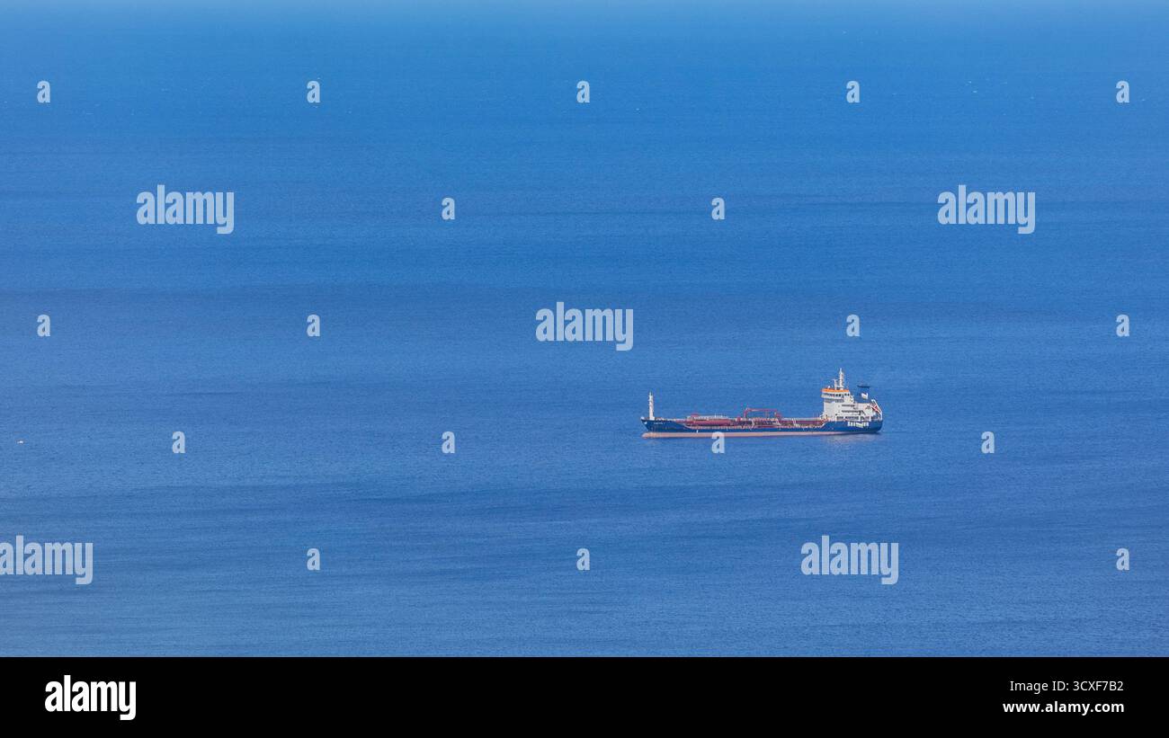 Single Ship Single ship in a large ocean sea, minimalist Stock Photo - Alamy