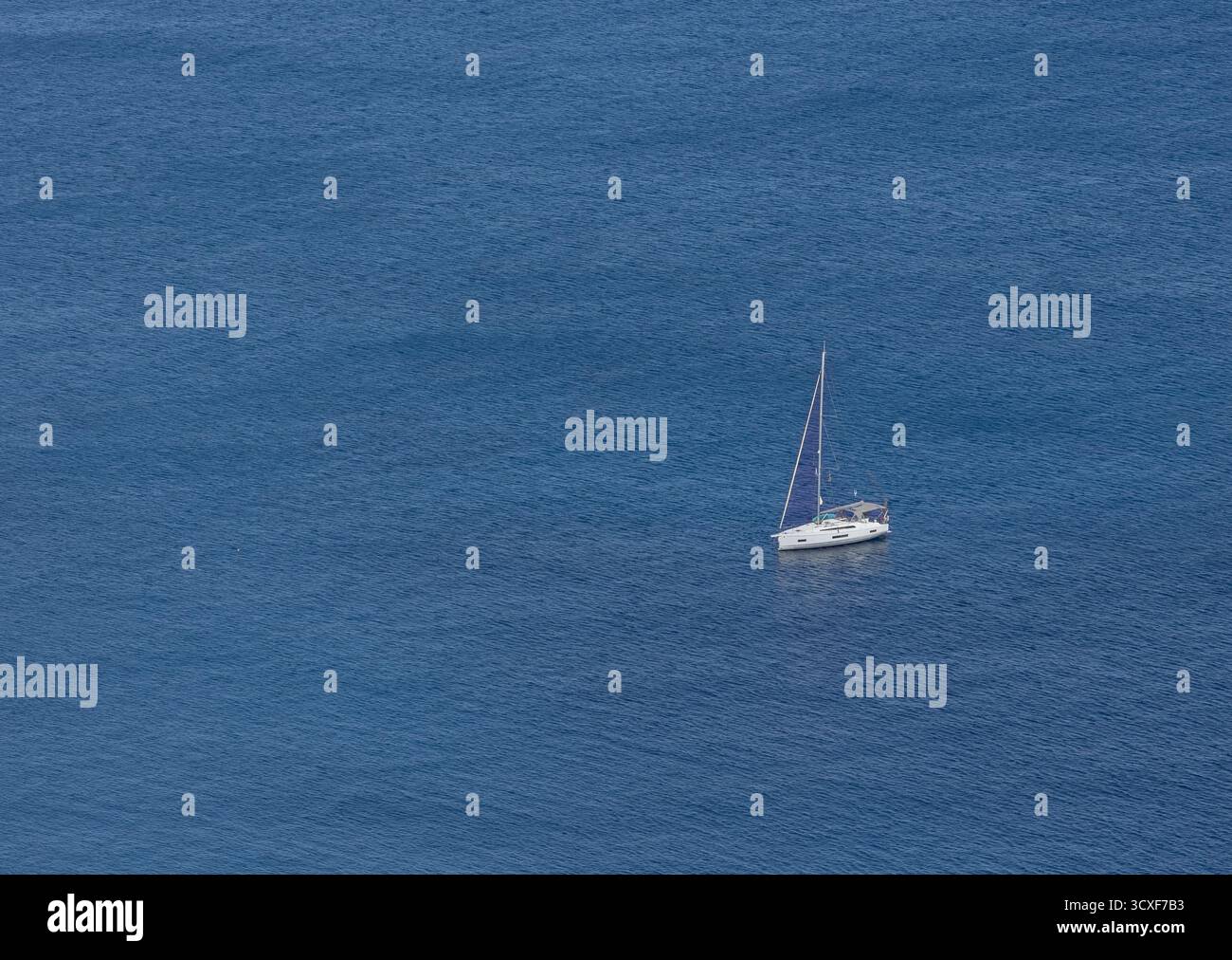 Single Ship Single ship in a large ocean sea, minimalist Stock Photo - Alamy