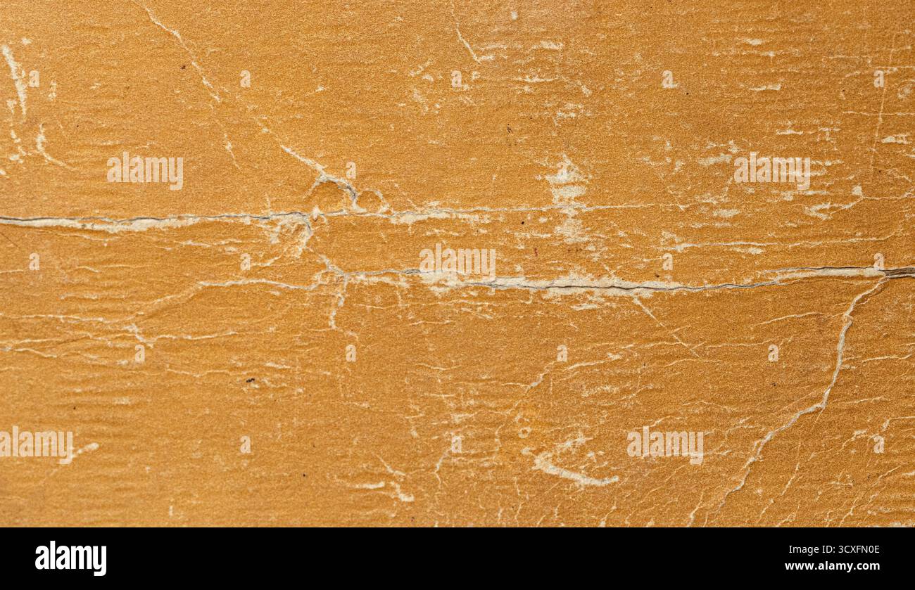 Brown battered cardboard showing a grunge surface texture Stock Photo