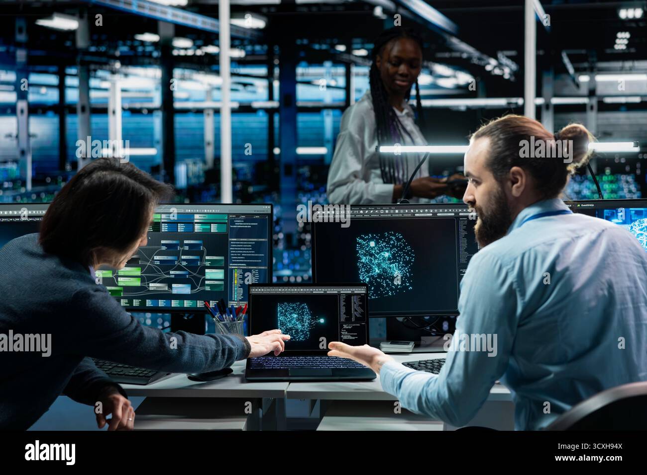 Teamworking colleagues in data center using AI LLM assistant to do ...