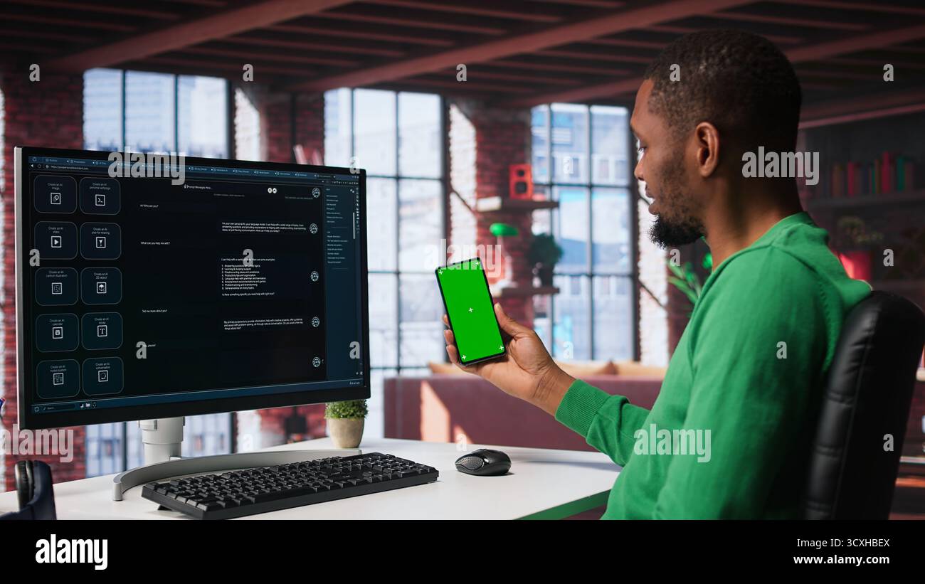 Black guy interacting with intelligent AI chatbot on pc next to copy space screen, using smart innovative system. Machine learning enhances efficiency through advanced algorithms. Camera B. Stock Photo