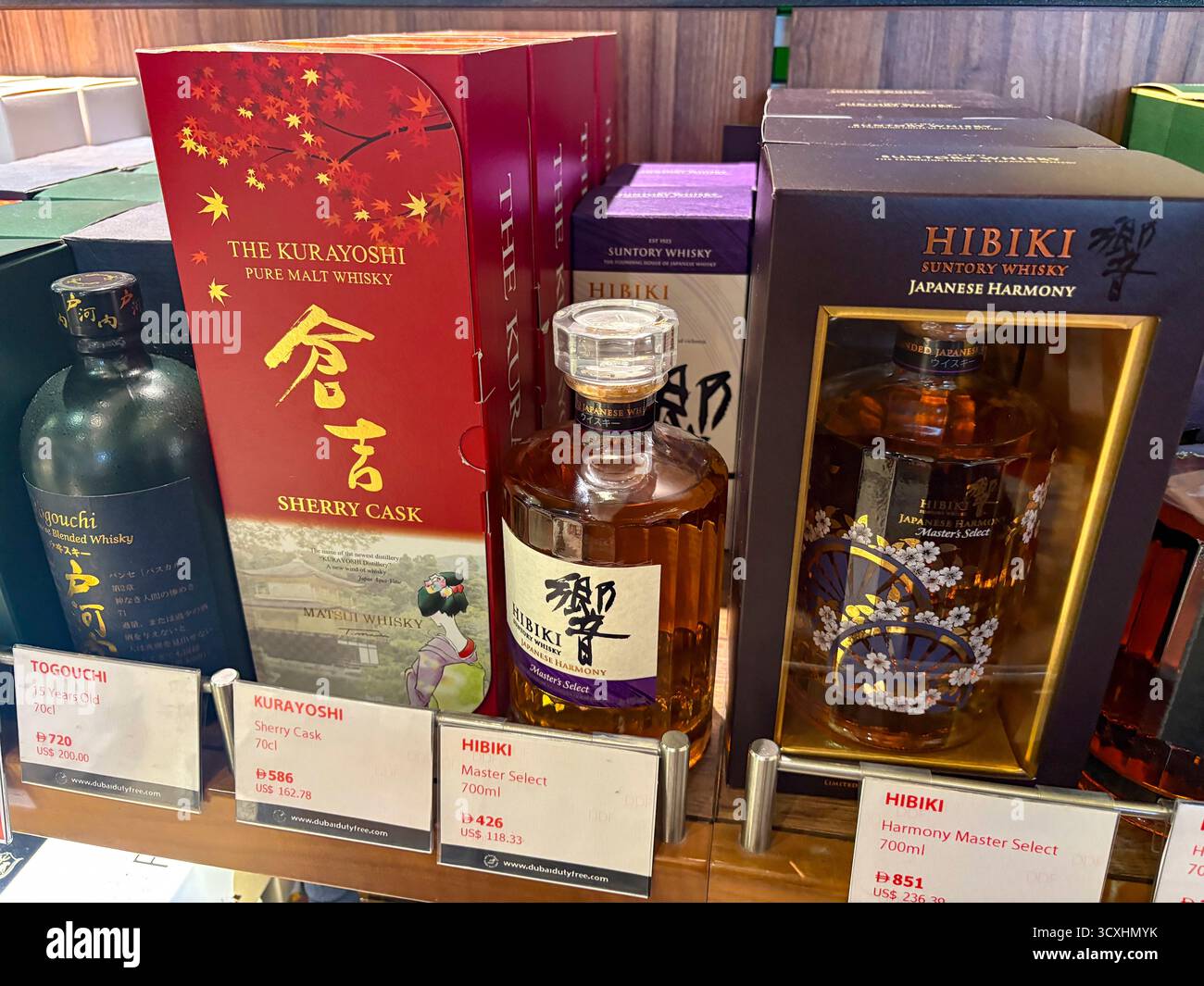 Japanese whisky, Hibiki master harmony and master select whisky with Kurayoshi pure malt whisky, Togouchi whisky 15 year old, Dubai airport duty free - Smartphone Captured Stock Image