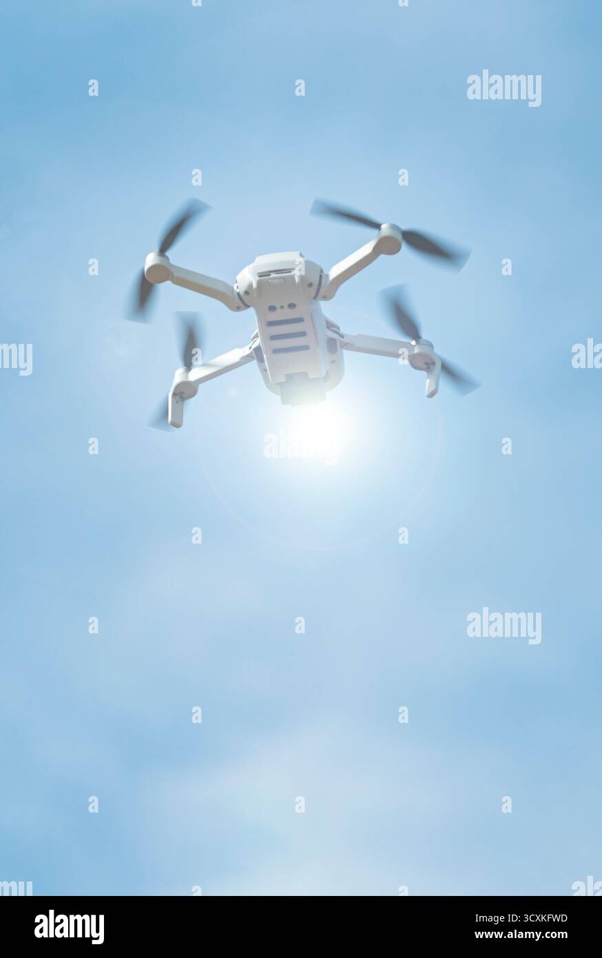 Drone on the Clouded Sky Stock Photo