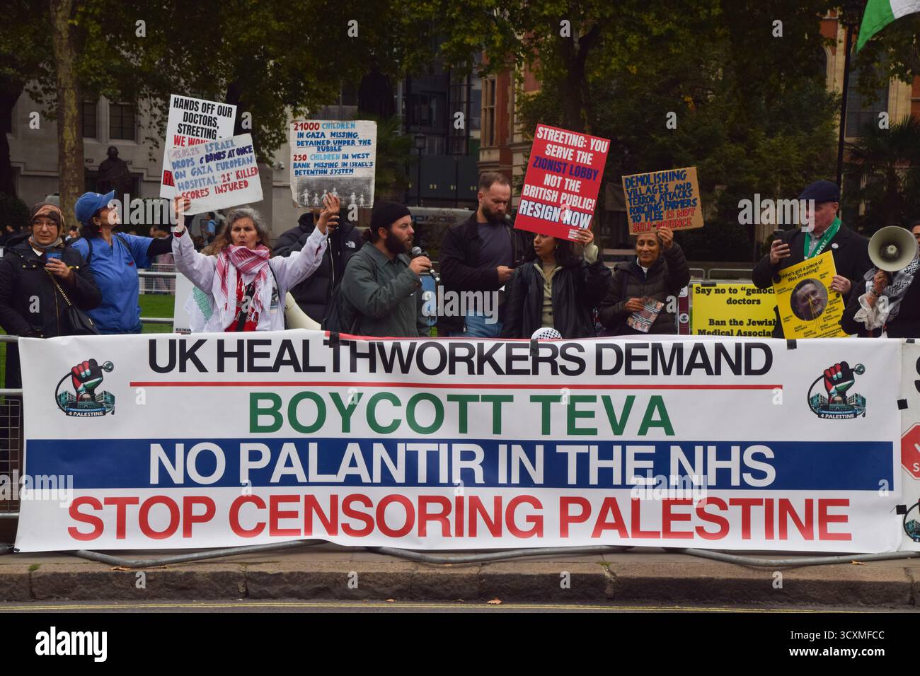 London, England, UK. 15th Oct, 2025. A banner is displayed calling for a boycott of Teva, against Palantir in the NHS and against censoring Palestine. Pro-Palestine healthcare workers and protesters gathered in Parliament Square in support of free speech and in solidarity with Dr Rahmeh Aladwan and other medical workers who have faced suspension over their social media posts, and in support of medical workers in Gaza. The protesters also demand the resignation of Health Secretary Wes Streeting, whom they accuse of 'serving the Zionist lobby' (Credit Image: © Vuk Valcic/ZUMA Press Stock Photo