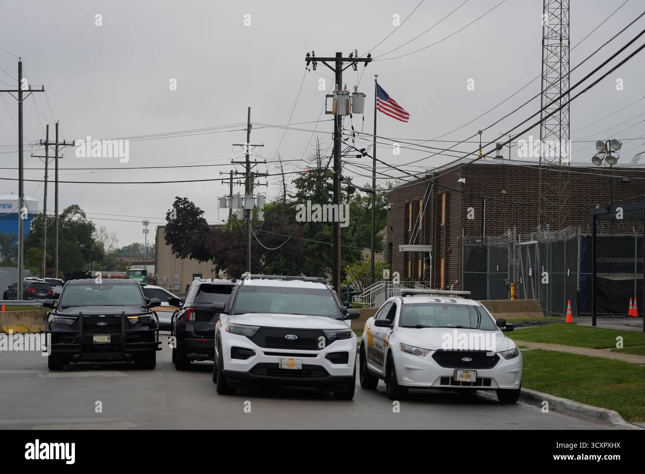 Illinois State Police and Cook County Sheriff's vehicles block the road ...