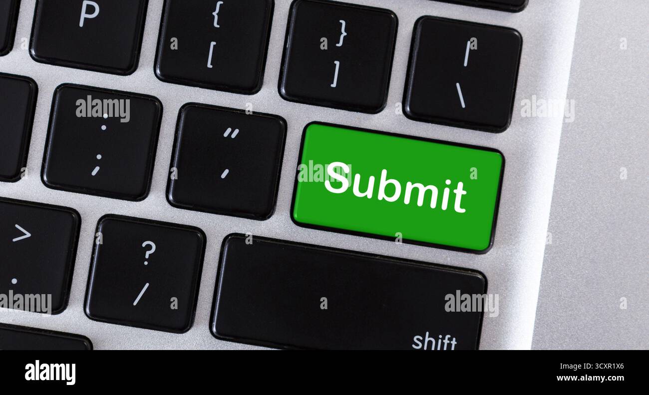Word Submit on green button of keypad Stock Photo
