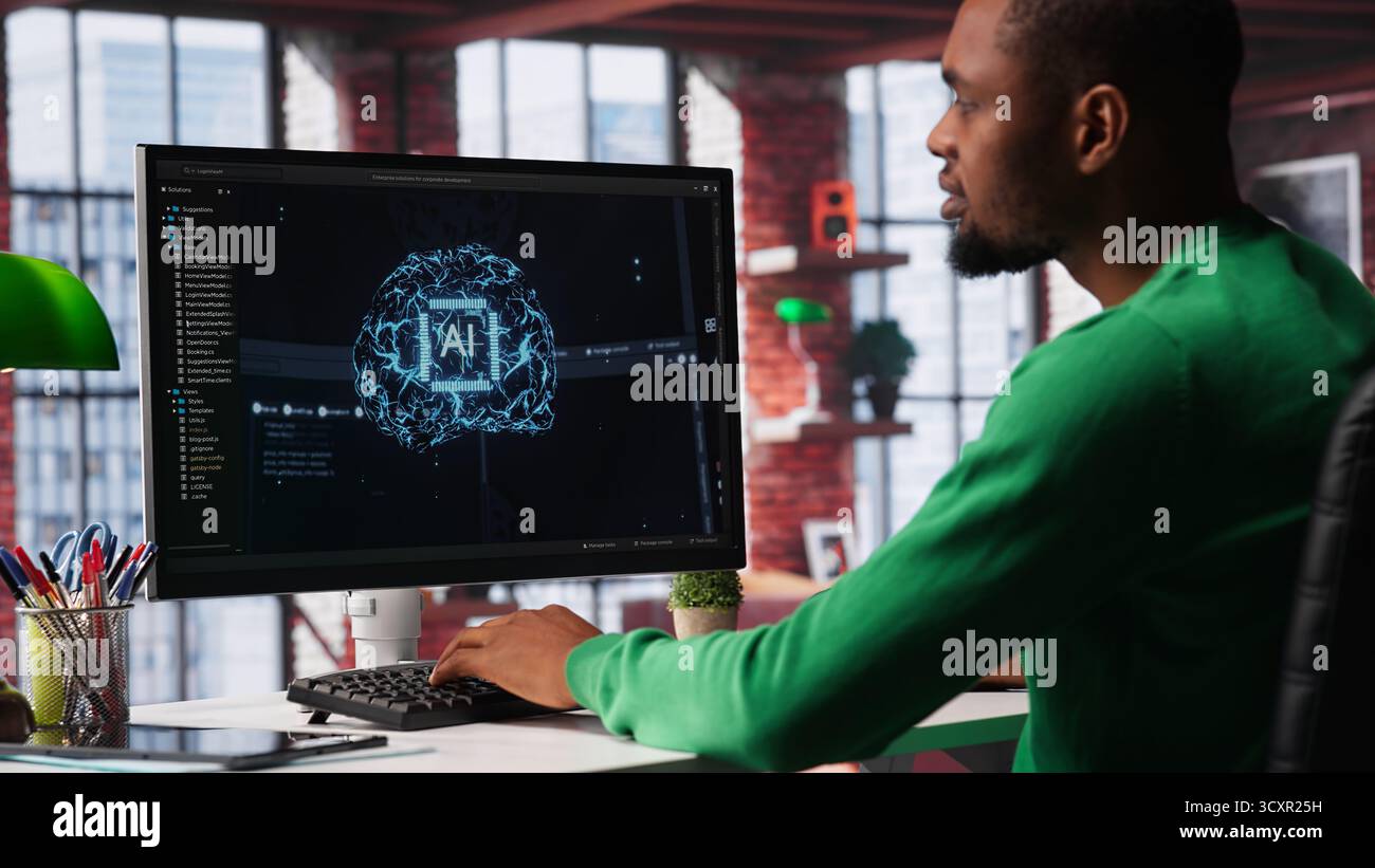 System engineer coding AI brain model of neural network for machine learning, solving tasks on computer. Debugging software algorithm and checking for errors, innovation. Camera A. Stock Photo
