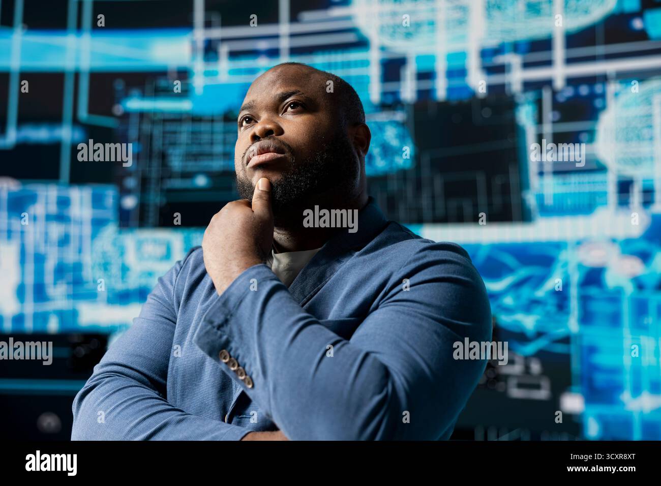 Tech savvy African American specialist analyzing big data AI brain using cloud computing tools and advanced programming for virtual assistant development and automation systems. Cybernetics. Stock Photo