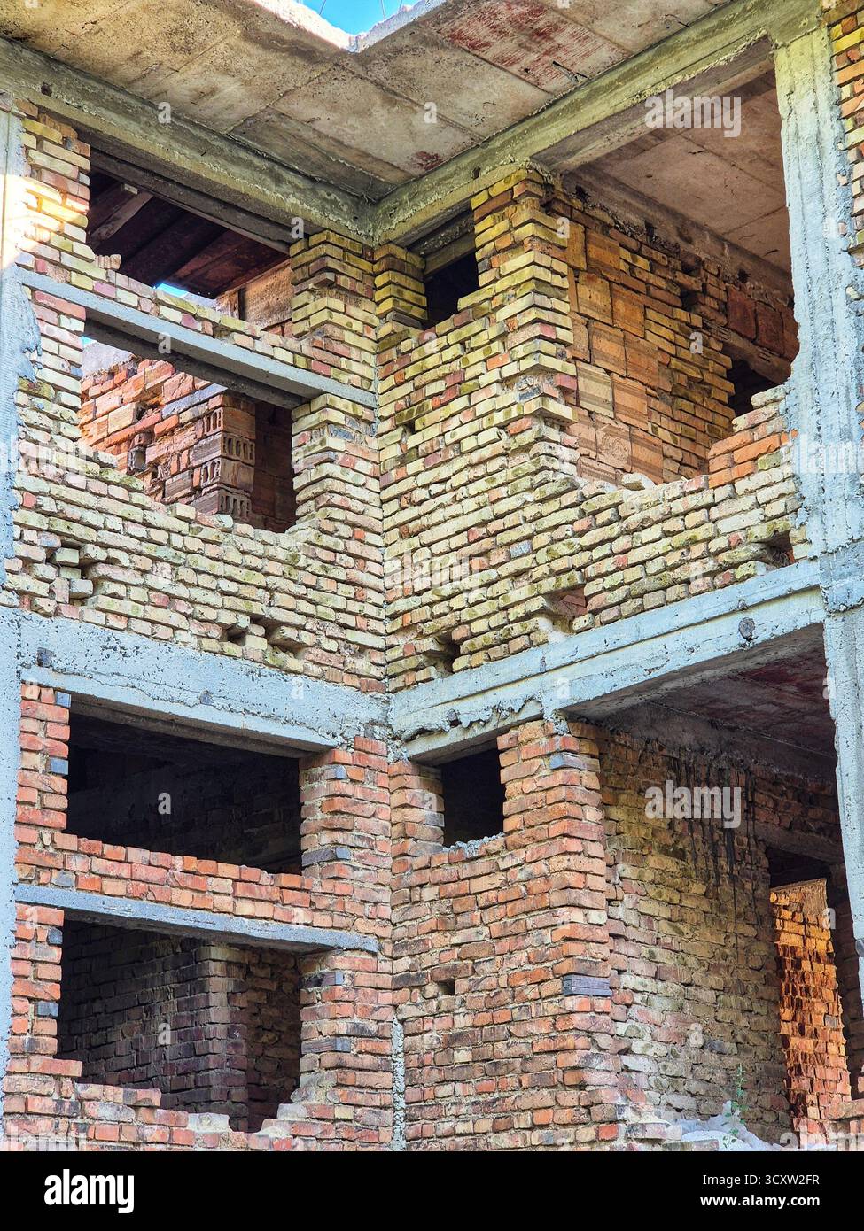 old abandoned building in the city. Remains of a Forgotten Structure - Smartphone Captured Stock Image