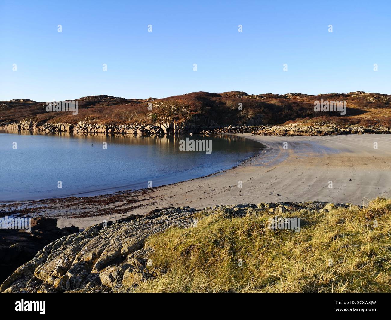 Walking the sandy tidal causeway to Erraid Island, Ross of Mull, Scotland—Kidnapped location linked to Robert Louis Stevenson and David Balfour. - Smartphone Captured Stock Image