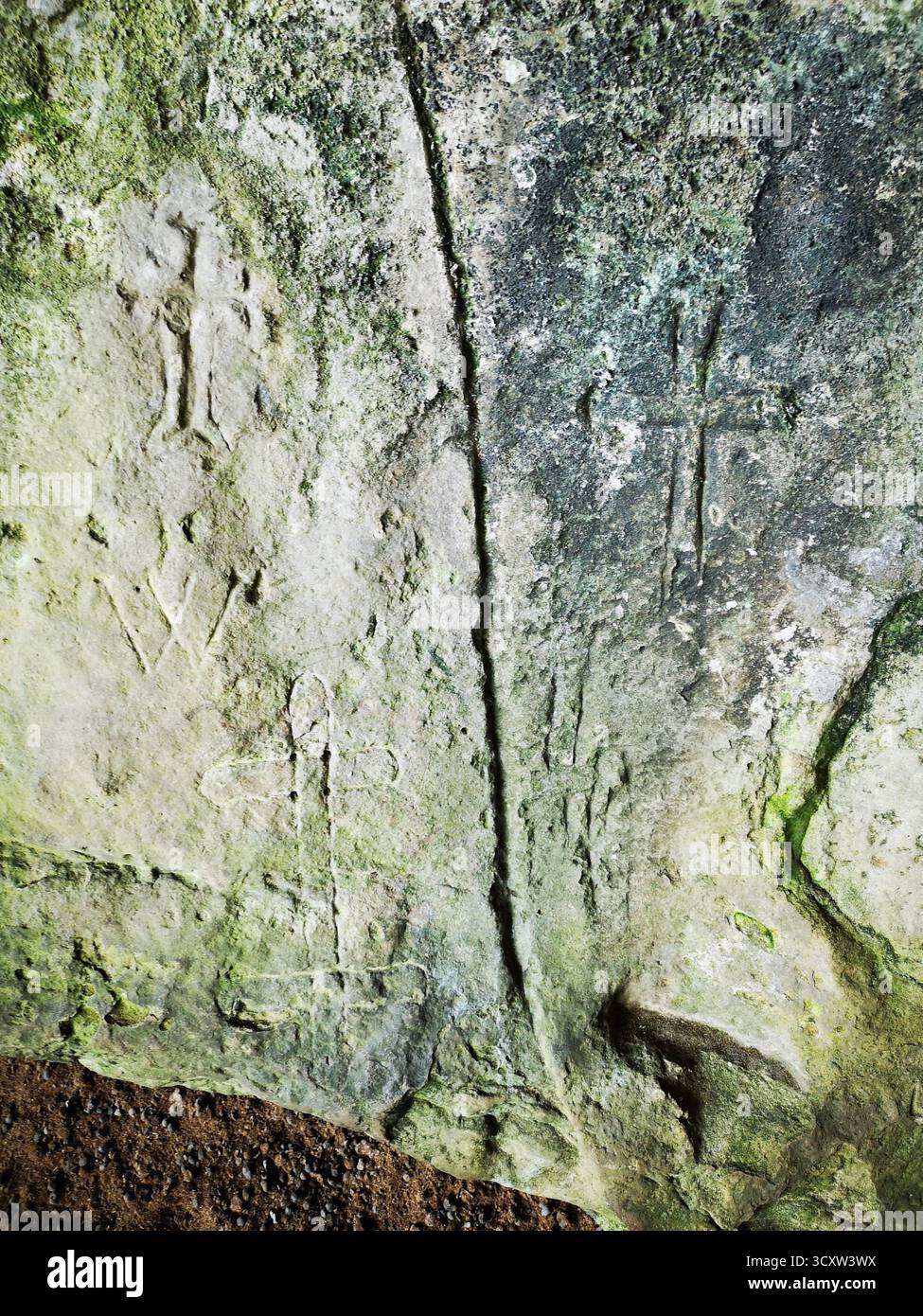 Nun’s Cave, Ross of Mull, Scotland—ancient Christian site with carved crosses close  Ardalanish Bay, Isle of Mull, Inner Hebrides near Carsaig Arches. - Smartphone Captured Stock Image