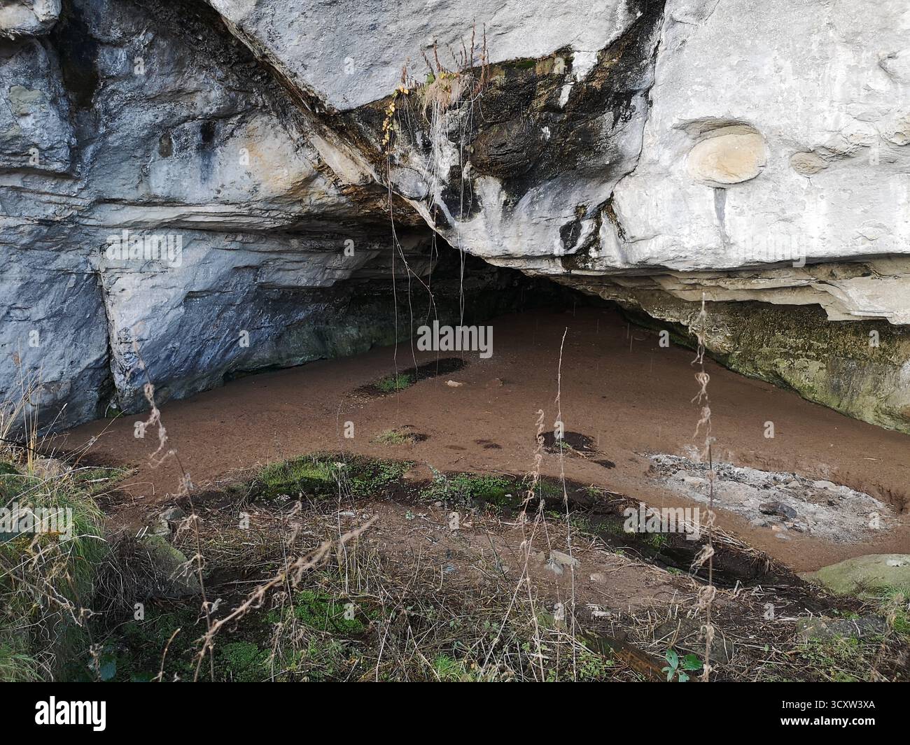 Nun’s Cave, Ross of Mull, Scotland—ancient Christian site with carved crosses close  Ardalanish Bay, Isle of Mull, Inner Hebrides near Carsaig Arches. - Smartphone Captured Stock Image