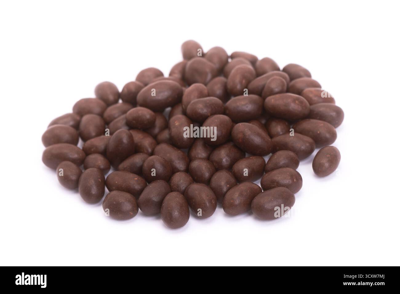 Peanuts covered in chocolate isolated on white Stock Photo