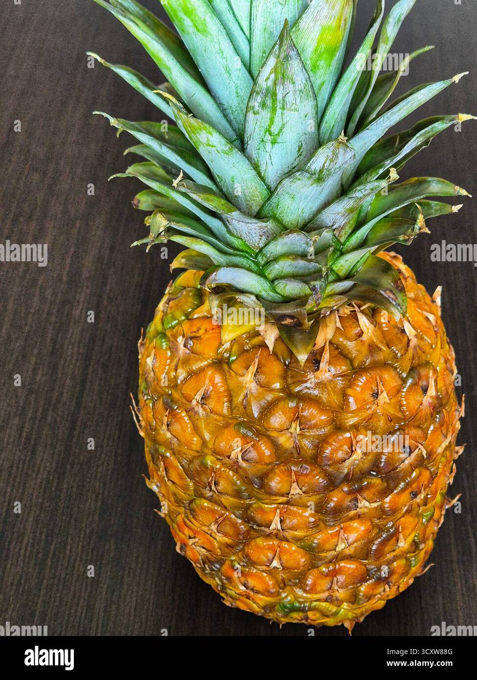 pineapple on the table close-up - Smartphone Captured Stock Image