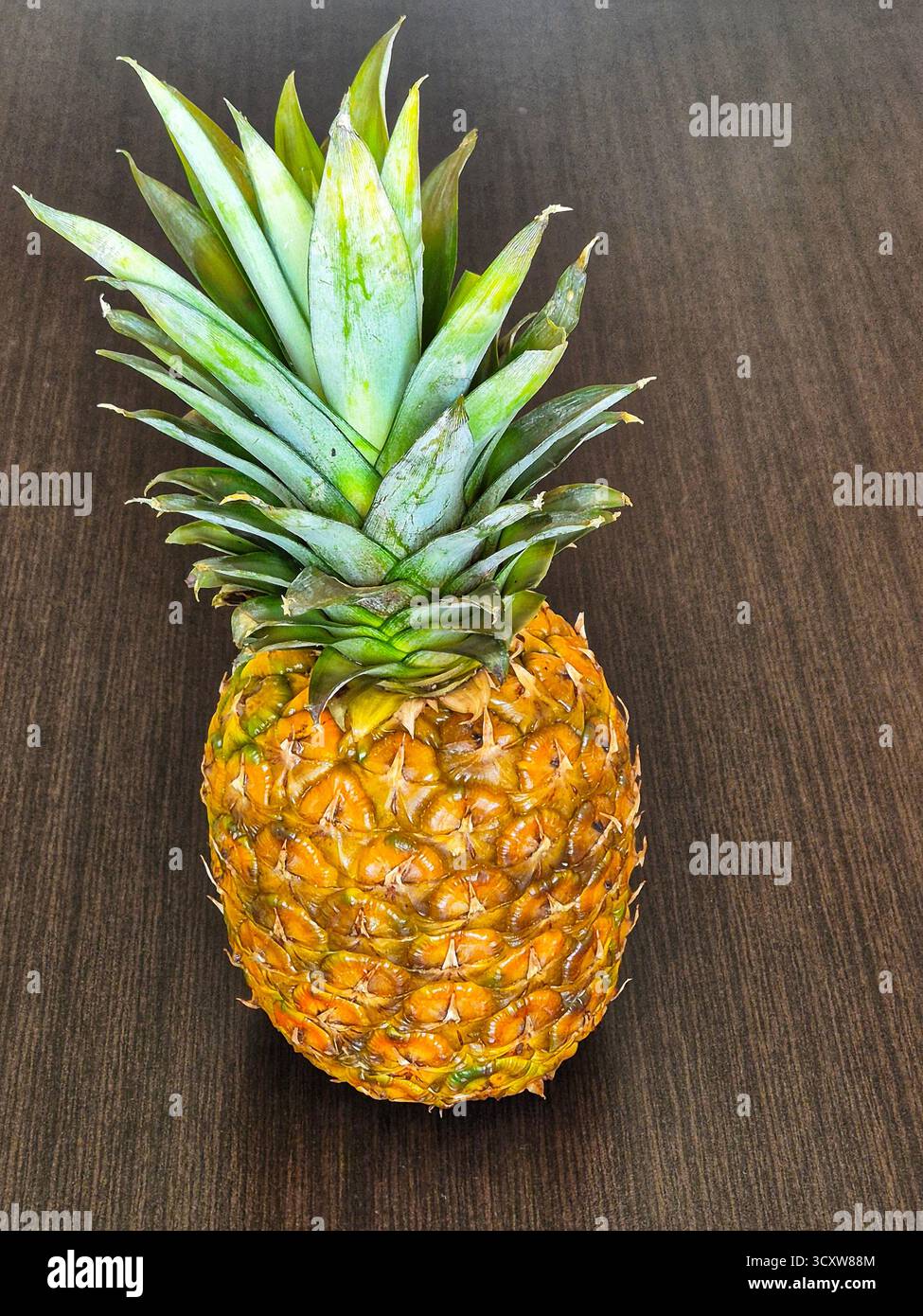 pineapple on the table close-up - Smartphone Captured Stock Image
