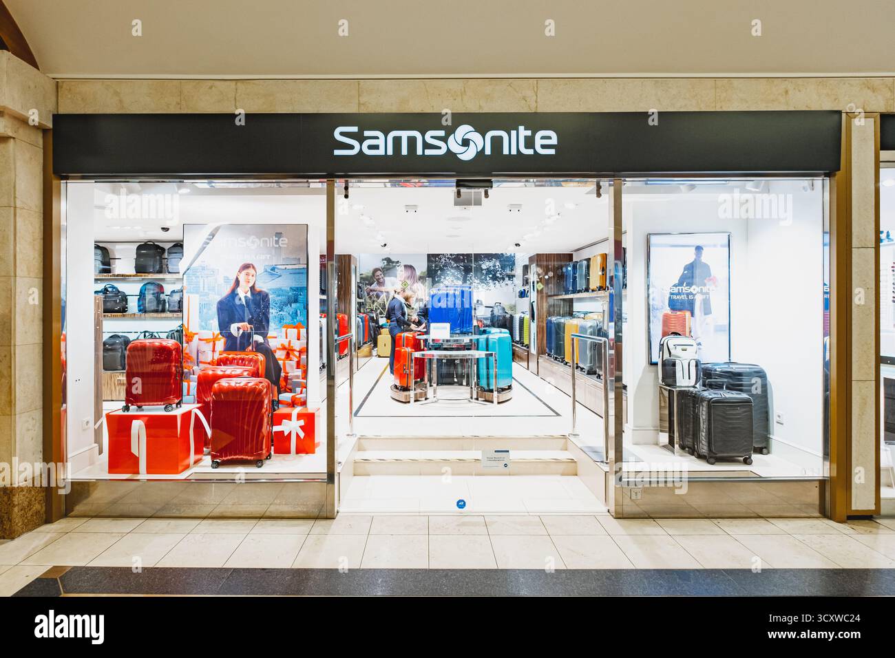 Samsonite premium luggage manufacturer brand's logo at the entrance to the shop Stock Photo