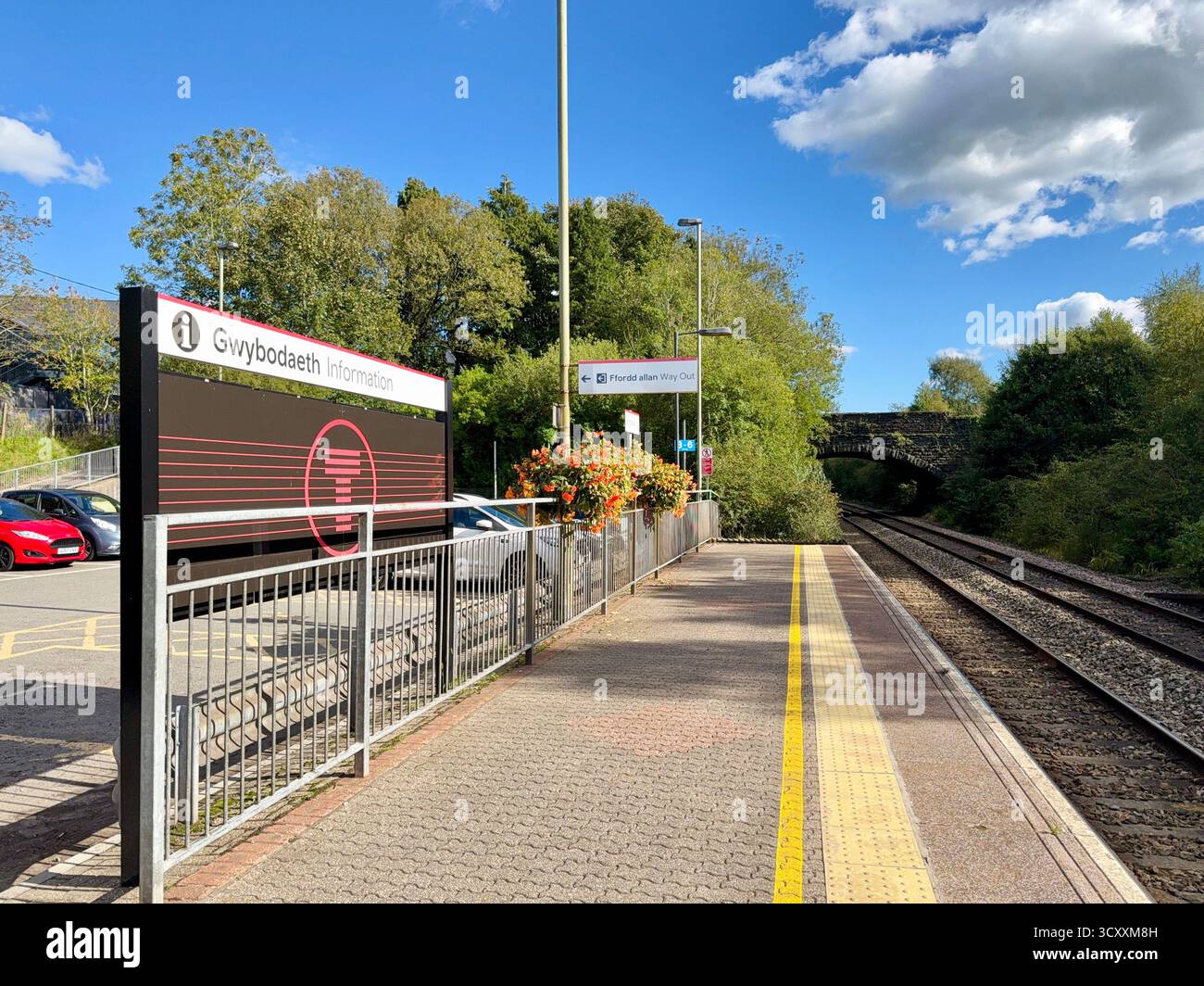 Pontyclun, Rhondda Cynon Taf, Wales, UK - 22 September 2025: Transport for Wales information board on a platform at Pontyclun railway station - Smartphone Captured Stock Image
