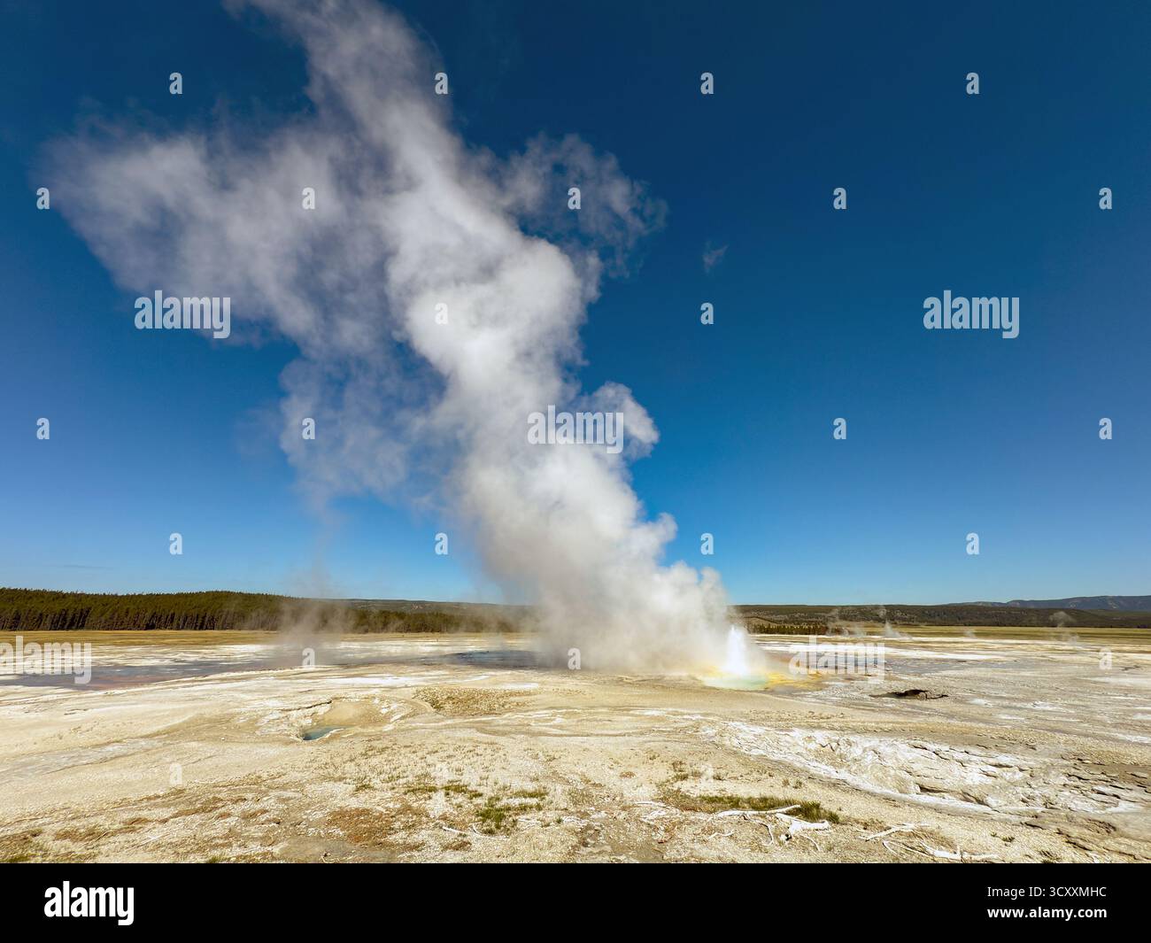Wide angle scenic view of the Fountain Geyser on the Fountain Paintpots Trail in Yellowstone National Park. - Smartphone Captured Stock Image