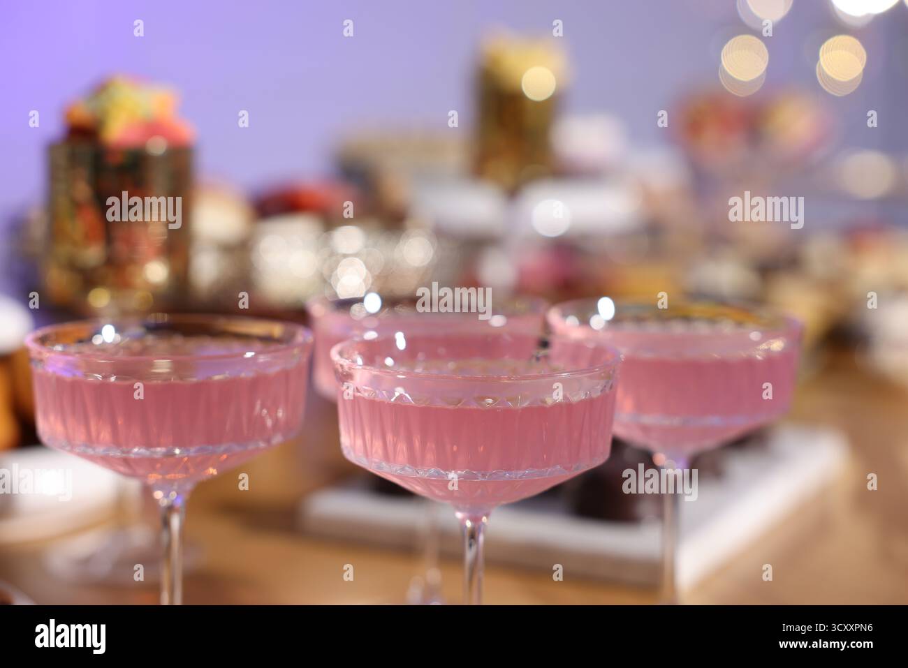 Buffet menu. Delicious desserts and drinks on table, selective focus Stock Photo