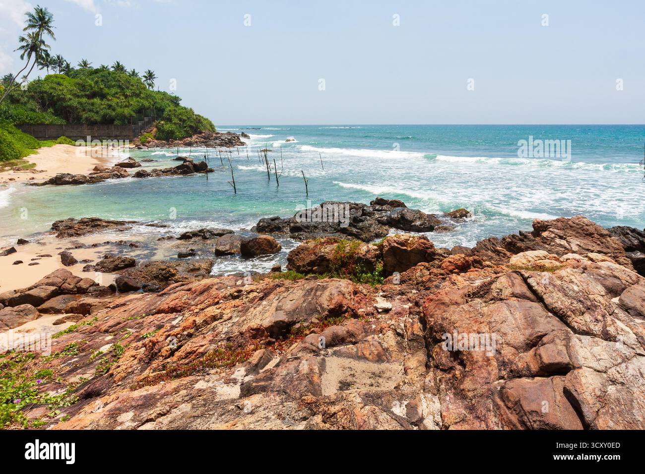 Rusty Reddis Beach Rocks Tropical island rugged reddish hi-res stock photography and images - Alamy