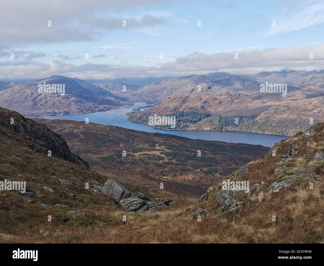 View from Ben Venue over Loch Katrine, Garradh, Maol Mor, Cruinn Bheinn and Glen Finglas in the Trossachs, Scotland in autumn. Highland landscape. - Smartphone Captured Stock Image